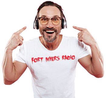 FTM  350px Fort myers radio t shirt man listening to music headphones pointing shutterstock_1054799690